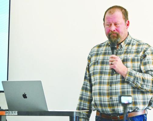 CHARLES NOYD, a deltiologist from Polk County, gave a presentation on Wooster’s Lane during Sunday’s meeting in Central City. Deltiology is the study and collection of postcards. Photo by Michael Happ