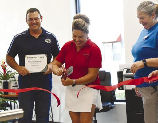 SHELLY URKOSKI, owner and founder of Resilient Rehab, cuts the ribbon on the practice’s new Central City location earlier this month. Photo by Jordan Coslor