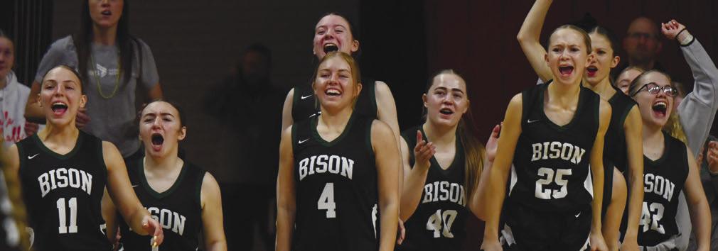 MEMBERS of the Central City High School girls’ basketball team celebrate a basket during the Bison’s quarterfinal game of the NSAA Class C1 Girls State Basketball Championships in Lincoln last Wednesday. The Bison made an early exit from the tournament, falling to Milford 37-34. Photo by Jordan Coslor