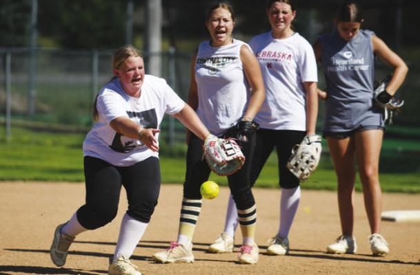 PAIGE GRIGSY participates in infield drills in a practice ahead of Central City’s opening day game with Boone Central on Thursday. Photos by Jordan Coslor