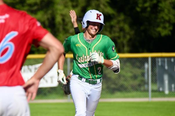 Blake Jensen flashes a smile as he heads to home plate after hitting an impressive homerun in Sunday afternoons game against Aurora.