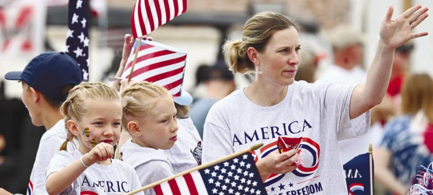 THE RED, WHITE, AND BLUE was on full display over the weekend during Central City’s annual Lone Tree Days celebration. Above, participants in Saturday’s Lone Tree Days Parade were decked out for America’s semisesquicentennial. Photo by Michael Happ