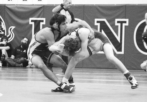 WESLEY PENN attempts to take down Ansley-Litchfield’s Kolten Clay in the first consolation round of the Burwell Invite. Photos by Monte Steele