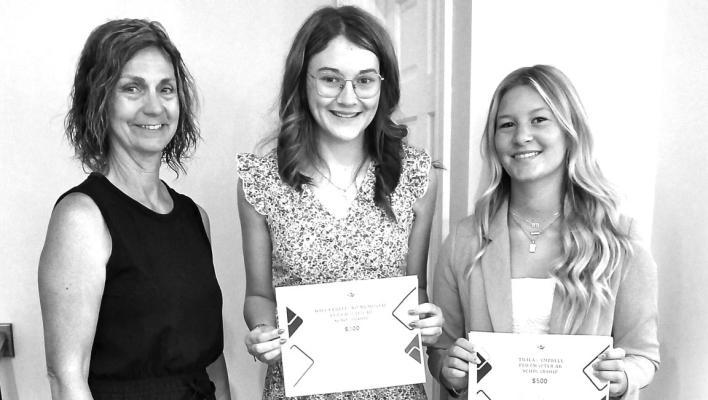 Left to Right: Karen Benner, Scholarship Committee Chairman; Emily Gay; Bailey Greving.. Not pictured, Kylie Muller.