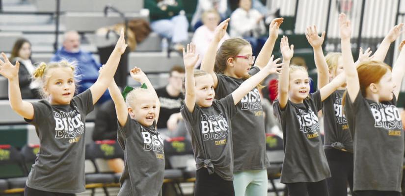 SOME OF CENTRAL CITY’S YOUNGEST DANCERS took center court at the Bison Activity Dome on Friday night during the Bison’s boys’ basketball game against Doniphan-Trumbull. The young dancers performed a routine for the crowd present, helping cap off a busy week of activities at Central City Public Schools. Photo by Jordan Coslor
