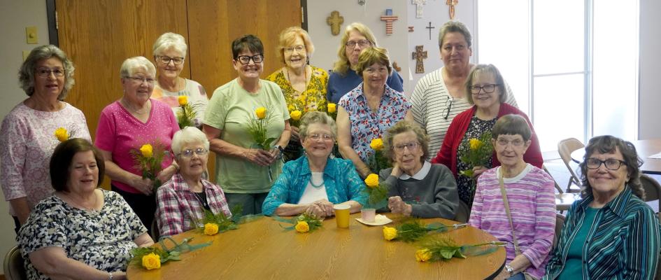 On Monday morning volunteers from the Merrick Medical Center Auxiliary Thrift Shop were thanked and given yellow roses for their dedication.