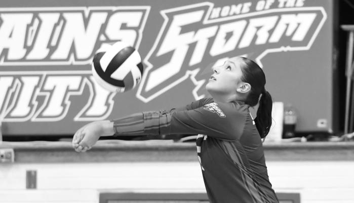 GAHVI LESIAK passes the ball to a teammate in High Plains’ 3-0 win over McCool Junction last Tuesday. Lesiak led the Storm with eight digs and twenty assists. Photos by Jordan Coslor