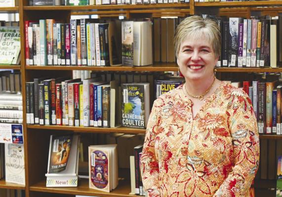 CENTRAL CITY PUBLIC LIBRARY DIRECTOR SARA LEE recently retired from her post after having spent a combined twenty years of service to the community. Lee said the thing she will miss most about the job is all the great people she had worked with. Photo by Jordan Coslor