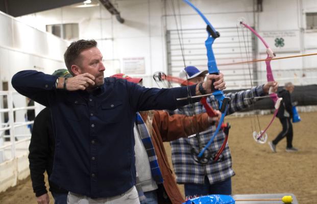 Aiming for Health Last Wednesday the annual Merrick Medical Center Men’s Night made a return aiming to promote health and also fun for the men of our community. Trent Wagner tried his hand at archery where he shot at targets launched in the air as part of just one of many exciting options for fun on the special night.