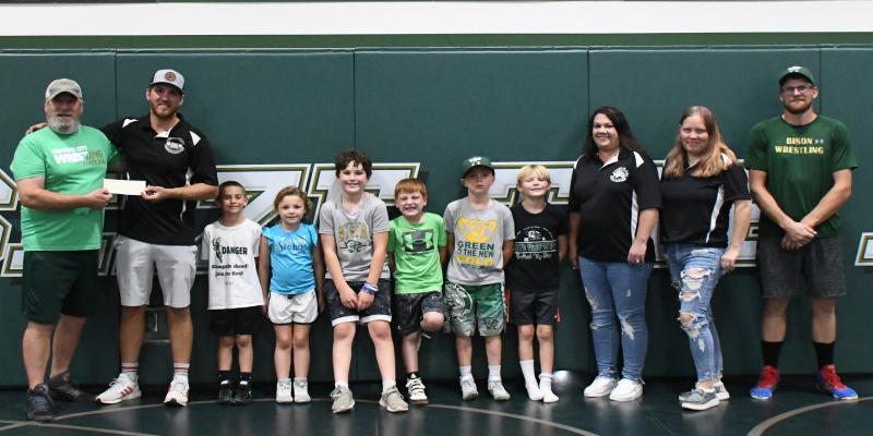 Summer Events Pay Off After hosting several successful events this summer the River Rats Association was able to give back to the community. One organization they were able to donate to was the Central City Junior Wrestling program. The River Rats presented a check for $1,400 to a few of the member last Wednesday evening during open mat practice for the youth.