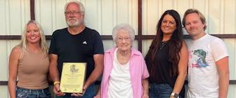 Continuing Farming Traditions After maintaining continuous ownership of farmland for over 100 years Doris Rasmussen (center) received the Pioneer Award last summer during the Hamilton County Fair. The family plans to continue farming the land in hopes to receive the Heritage Award in the next 25 years.
