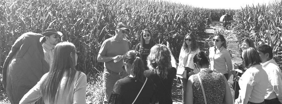 Mexican nutritionists and buyers discuss crop conditions with Dave Bruntz, farmer from Friend, Nebraska.