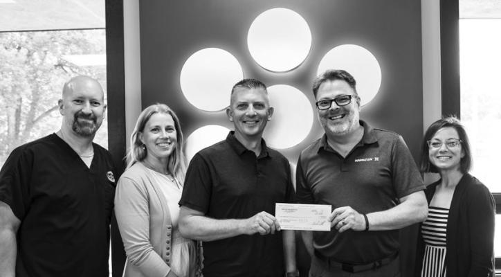 PICTURED during the check presentation recently are David Lee, Courtney Retzlaff, and Nick Ryan of the Central City Investment Club and Hamilton Chief Executive Officer John Nelson and Hamilton Chief Administration Officer Jannelle Seim. Courtesy Photo
