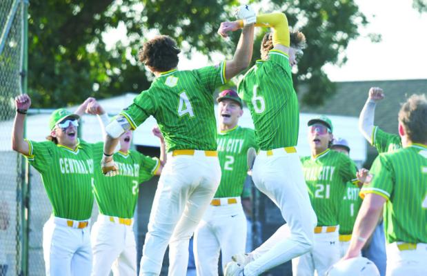 THE CENTRAL CITY SENIORS celebrate at home plate after Colbyn Peters’ second-inning home run in their game with West Point on Sunday evening at Kernel Field. Photos by Jordan Coslor