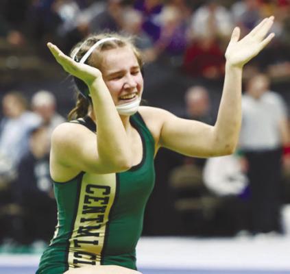 CENTRAL CITY’S MACI PETERS celebrates her quarterfinal victory over Minden’s Victo-ria Hansen last Tuesday afternoon at the NSAA Class B Girls State Wrestling Tournament. Photo by Jeremy Vauble
