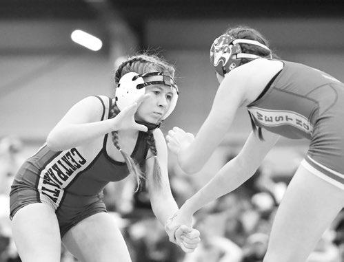 KHLOE MCNEFF grapples with West Holt’s Felycia Kerkman at last Thursday’s Norm Manstedt Invite in Columbus. Photo by Jordan Coslor