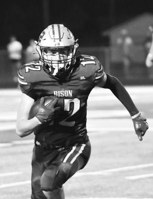 LUKE MCHARGUE cuts upfield for a big gain in the second half of Central City’s game with Milford. McHargue finished with twenty-one receiving yards and three tackles. Photo by Jordan Coslor