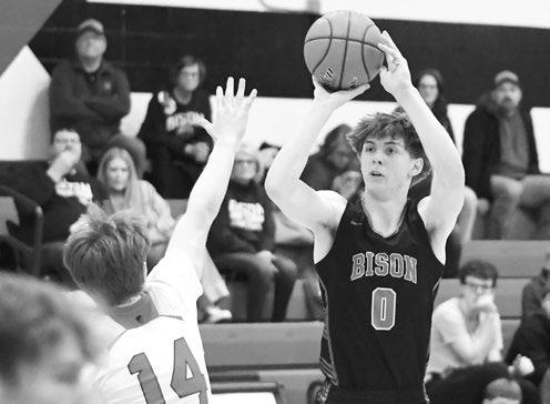 KAYDEN MORNER shoots and scores on a three-pointer in Central City’s 58-30 win over David City last Thursday. Morner finished the contest with fifteen points and four rebounds. Photo by Jordan Coslor