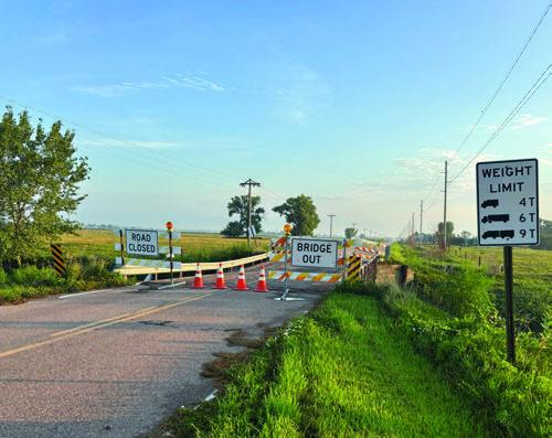A TIMBER BRIDGE crossing Prairie Creek on 7th Road just north of O Road buckled sometime before dawn on Saturday. Courtesy Photo