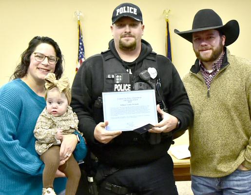 Some Heroes Wear Badges This past September was a memorable one for the Barton family as their daughter Millie was fighting for her life. In that moment of need, Central City Police Department officer Grady Wranek answered the call. Last week he was honored for his heroic actions with Millie and her parents Brittany and Merritt looking on.