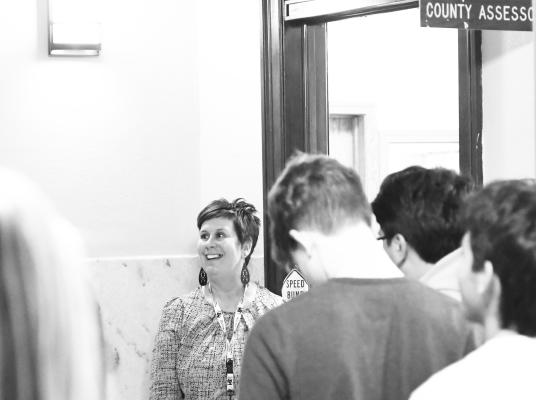 MERRICK COUNTY ASSESSOR JEN MYERS speaks to students on the second floor of the Merrick County Courthouse during County Government Day last week. Photos by Jordan Coslor