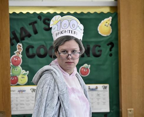 100 Days Brighter Central City Elementary School’s median staff age increased significantly on Tuesday as staff dressed to honor the 100th day of school. Sara Huebert was among those to dress for the occasion as she did her best to look 100 years old while also sporting a handcrafted hat to signal the occasion. (R-N Photo by Whitney Dettman)