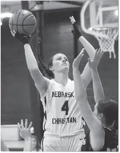 KADEYA SANBORN attempts a hook shot over th St. Mary’s defense. Sanborn finished with two points and six rebounds in the Eagles’ win.