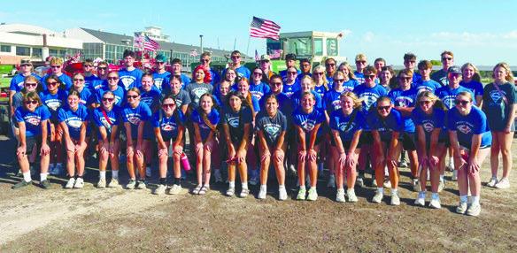 MEMBERS of the Palmer High School Marching Band swapped out their band uniforms for blue Sutton Squad t-shirts when performing at the Nebraska State Fair in Grand Island last week. The change was made over concerns due to the extreme heat last Wednesday. Courtesy Photo