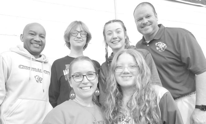 The Sports Cycle The current group of Bison wrestlers and coaches had a special moment at their district tournament in Pierce as they were able to snap a photo with Lilly Standar Chambers the first CCHS female wrestler.