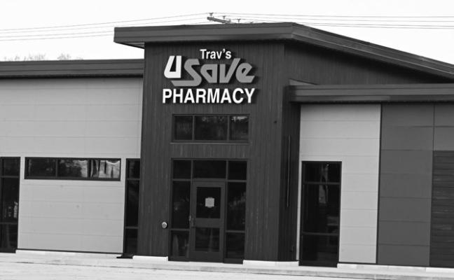 THE NEW HOME OF TRAV’S U-SAVE PHARMACY is nearing completion on Highway 30 in Central City. Signage was the most recent addition to the newly-constructed building. Photo by Michael Happ