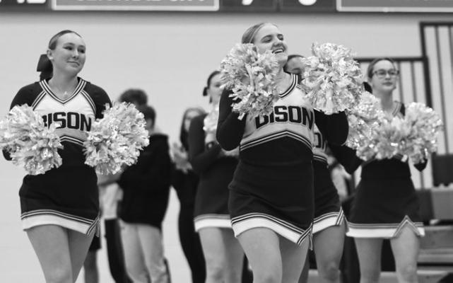 MEMBERS of the Central City High School Cheerleading Squad helped get the crowd fired up during last Monday afternoon’s games between Central City and Nebraska Christian in the Runza Holiday Shootout. Photo by Jordan Coslor