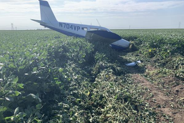 Crash Landing A Success Using skills he learned from flight training, Chris Brown successfully lands his aircraft during an emergency landing in a bean field north of Chapman.