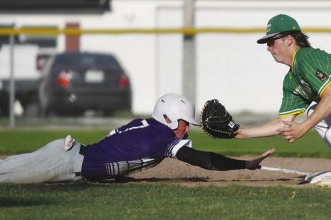CONNER ERICKSON attempts to pick off a Minden baserunner at first base. Against the Minden Seniors, Erickson earned one hit, scored one run, and drove in two runs to help Central City to a 3-2 victory.