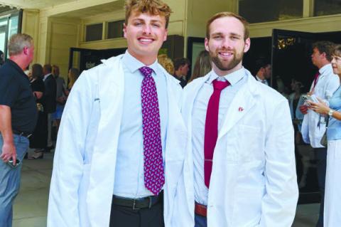 CAYDEN HOMOLKA AND KYLE DITTMER, both participants of the Grow Your Own program, are currently in their second year of medical school. Courtesy Photos