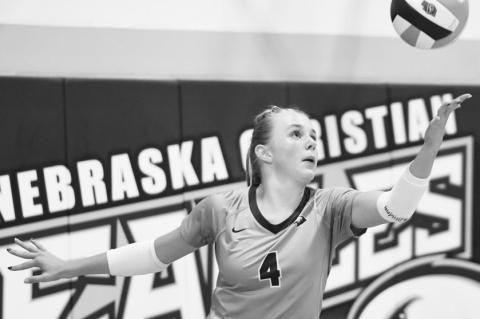 KINLEY MACKEN lines up a serve in Nebraska Christian’s 2-1 win over Elba last week. Macken led the Eagles with twelve kills in the match. Photo by Michael Happ