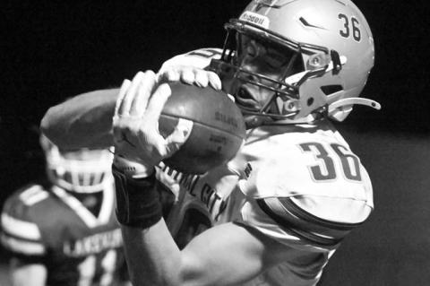 EVAN SCHRADER makes a catch near the sideline in the fourth quarter of Central City’s game with Columbus Lakeview, helping set up the winning touchdown on Friday night. Photos by Michael Happ