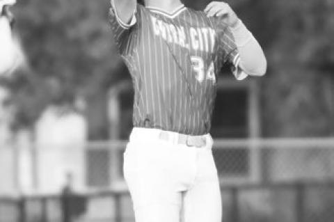 CONNER ERICKSON reels in a fly ball in foul territory to end the inning.