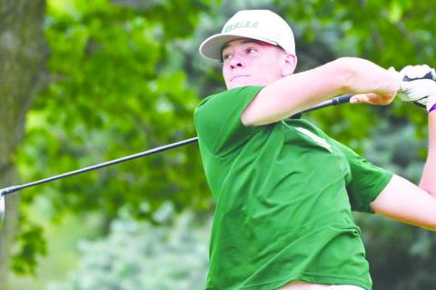 CENTRAL CITY’S KARTER NEGUS tees off on the seventeenth hole at last week’s NSAA Class C State Golf Championships. Negus finished the two-day tournament sitting tied for twenty-fourth place. Photos by Michael Happ