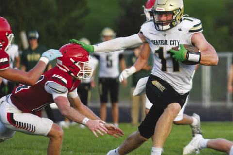 TURNER HANKE shakes off an Ord tackler on the way to a forty-three-yard touchdown reception. Hanke led Central City with fifty-three receiving yards against the Chanticleers. Photos by Jordan Coslor