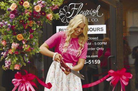 FALLON WELLS cut the ribbon on her new business in downtown Central City—Flourish Floral Co.—during a special ribbon cutting and open house event on Friday, July 3rd. Photos by Jordan Coslor
