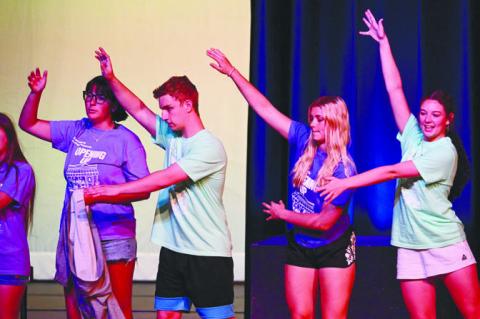 STUDENTS practice the final number of the first act of this year’s show, which was titled “Opening Up” after a song from the Broadway Musical Waitress.
