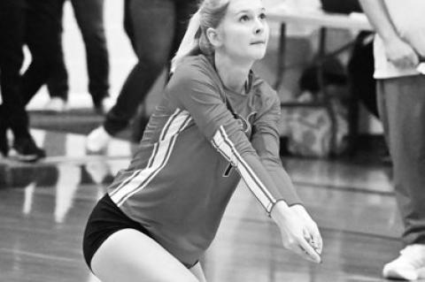 HIGH PLAINS COMMUNITY’S Tessa Morris digs up a pass from Newman Grove/St. Edward last Tuesday night in Elba.