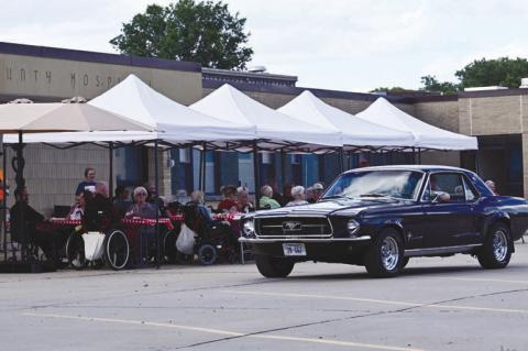 RESIDENTS AT LITZENBERG LONG-TERM CARE had the opportunity to enjoy a variety of cars during the facility’s annual Father’s Day barbecue after a drive-by car show was organized last week. Photo by Michael Happ