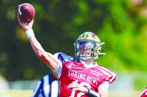 PARKER ZIKMUND completed three passes during Saturday’s Shrine Bowl. The South team beat the North team 14-7.