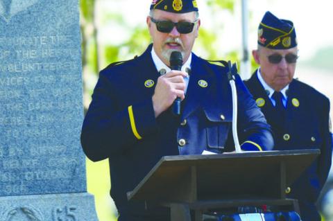 MEMORIAL DAY was observed at the Central City Cemetery outside of Central City on Monday, with services being conducted by the Central City American Legion Post 6. Above, Miles McGinnis delivered the Memorial Day address during the ceremony. Photo by Jordan Coslor