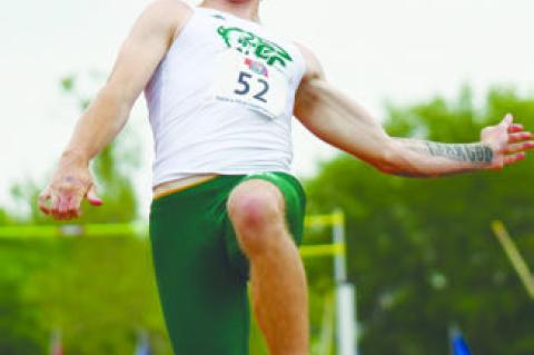 CENTRAL CITY’S WYATT DENT planted his feet in the sand at 23-07.25 to set a new Class B State Meet Record and secured a gold medal in the boys’ long jump at last week’s NSAA Class B State Track and Field Championships. Photo by Jordan Coslor