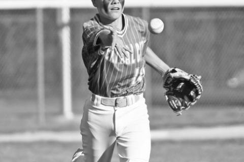 COLTON BOROFF tosses the ball to first base for an out after fielding a bunt in Central City’s 12-9 loss to Aurora. Photos by Jordan Coslor