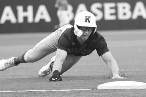 LUKE VAKINER dives into third base in Central City/Centura’s game with Mount Michael last Monday evening. Vakiner drew two walks and scored a run in the Kernels’ 6-5 loss to the Knights.