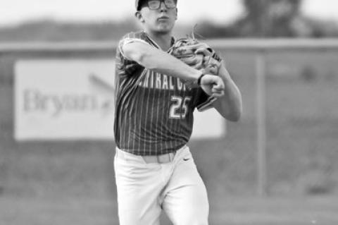 LOGAN VAKINER makes the throw to first base after fielding a ground ball at shortstop.