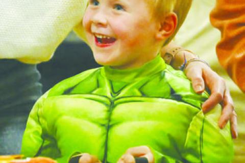 KIDS OF ALL AGES kicked off Halloween trick-or-treating on Sunday during the Central City Area Chamber of Commerce’s annual Parade of Goblins Event at the Merrick County Youth Agriculture and Education Center in Central City. Photo by Michael Happ